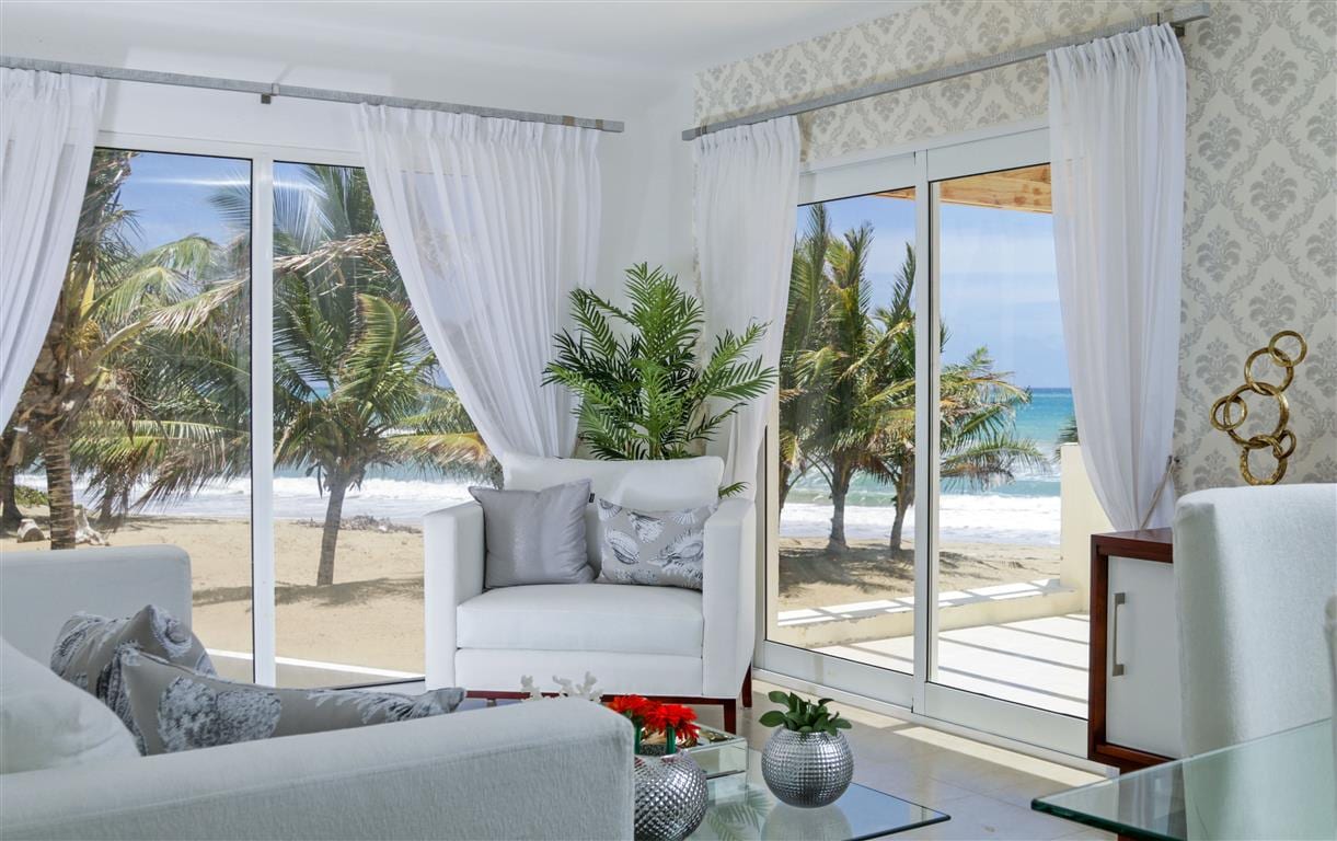 Ocean view living room at Cristamar – beachfront condo in Cabarete